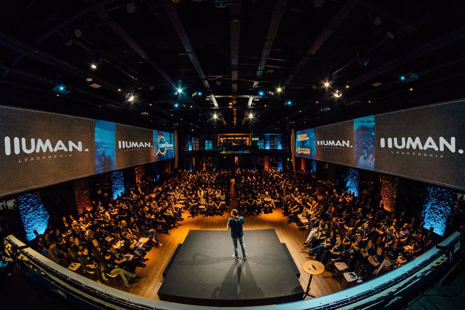 The HUMAN conference stage in front of a full audience